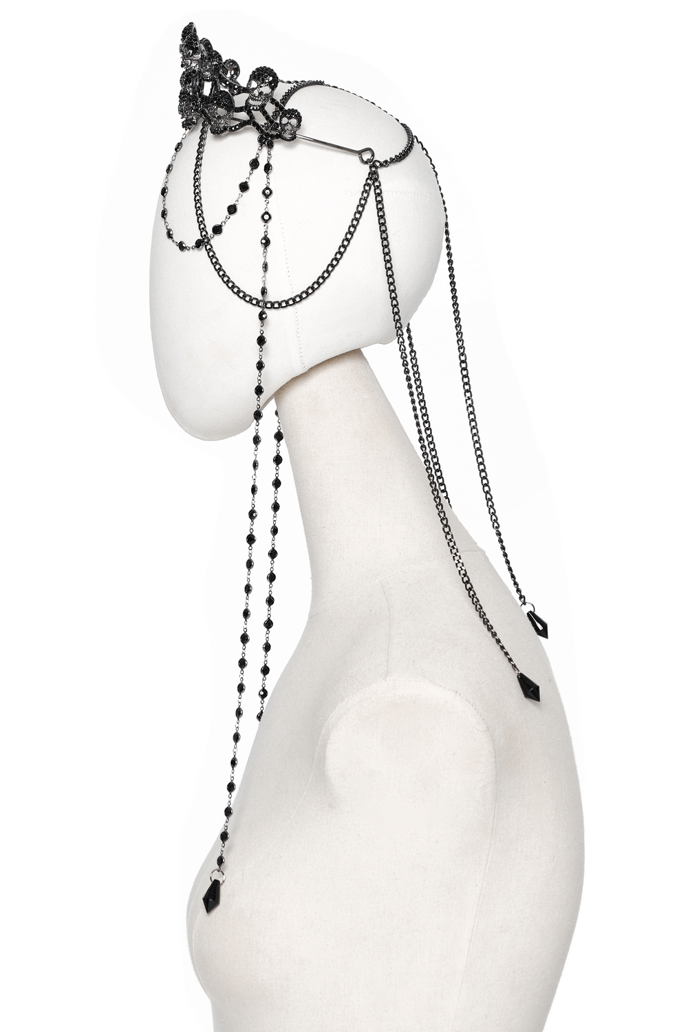 Black Gothic Skulls Crown headpiece with rhinestones and chains on a mannequin, showcasing a striking dark allure.
