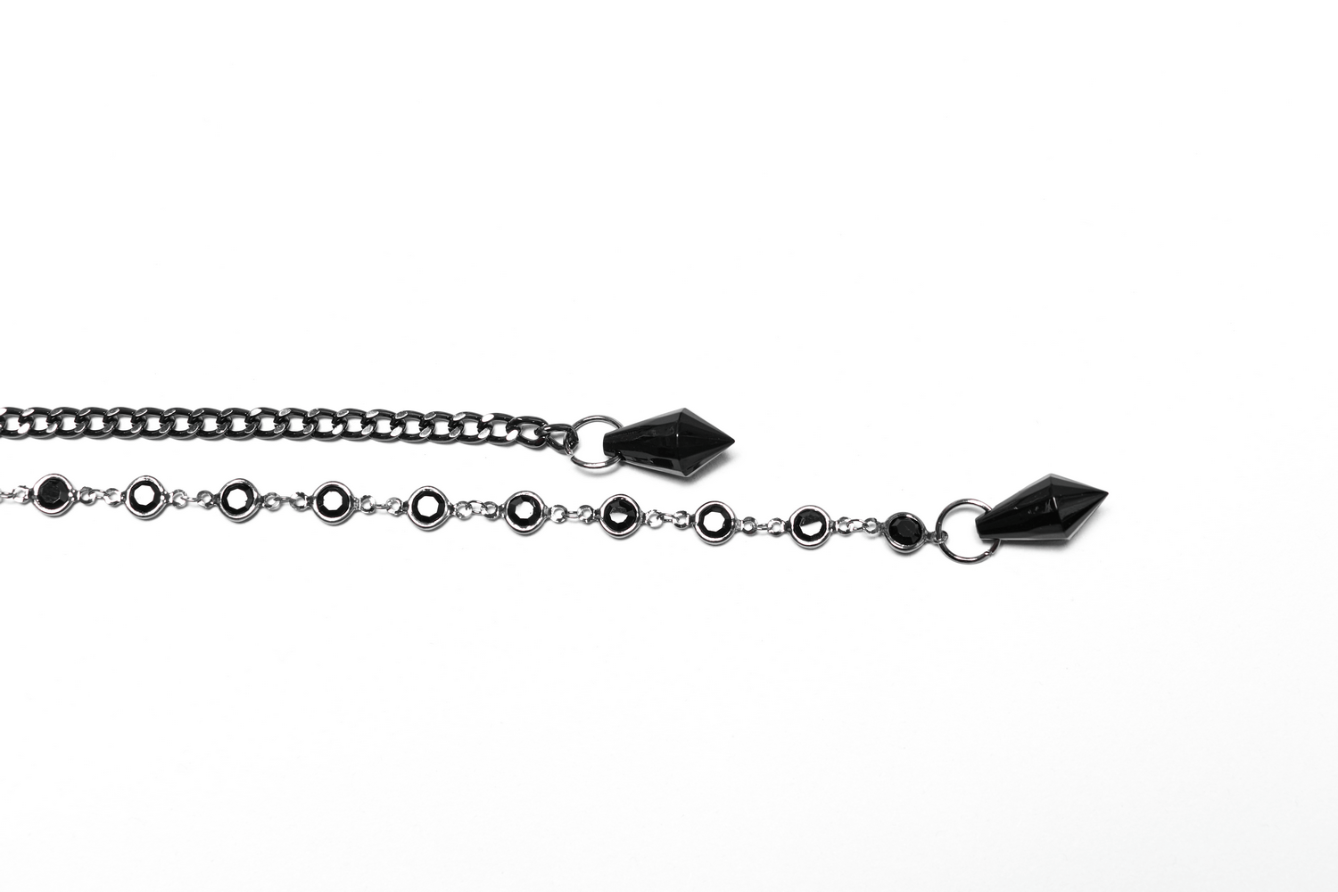 Elegant black chain necklace with spikes and circular accents, perfect for gothic or edgy fashion.