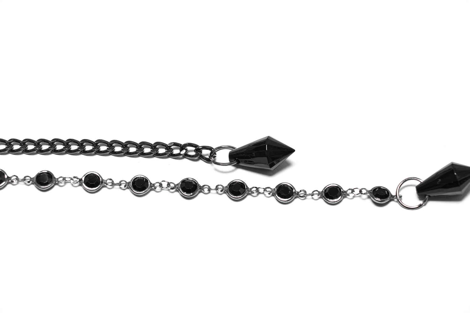 Elegant black gothic chain necklace with spikes and round accents, perfect for adding edgy style to any outfit.