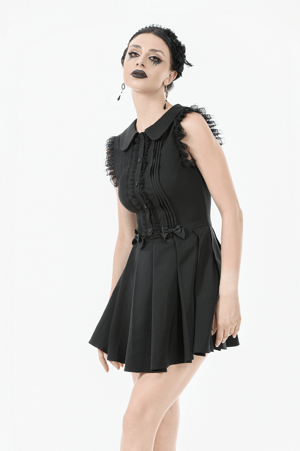 Black Gothic sleeveless dress with lace trim, Peter Pan collar, and pleated A-line skirt, perfect for alt fashion.