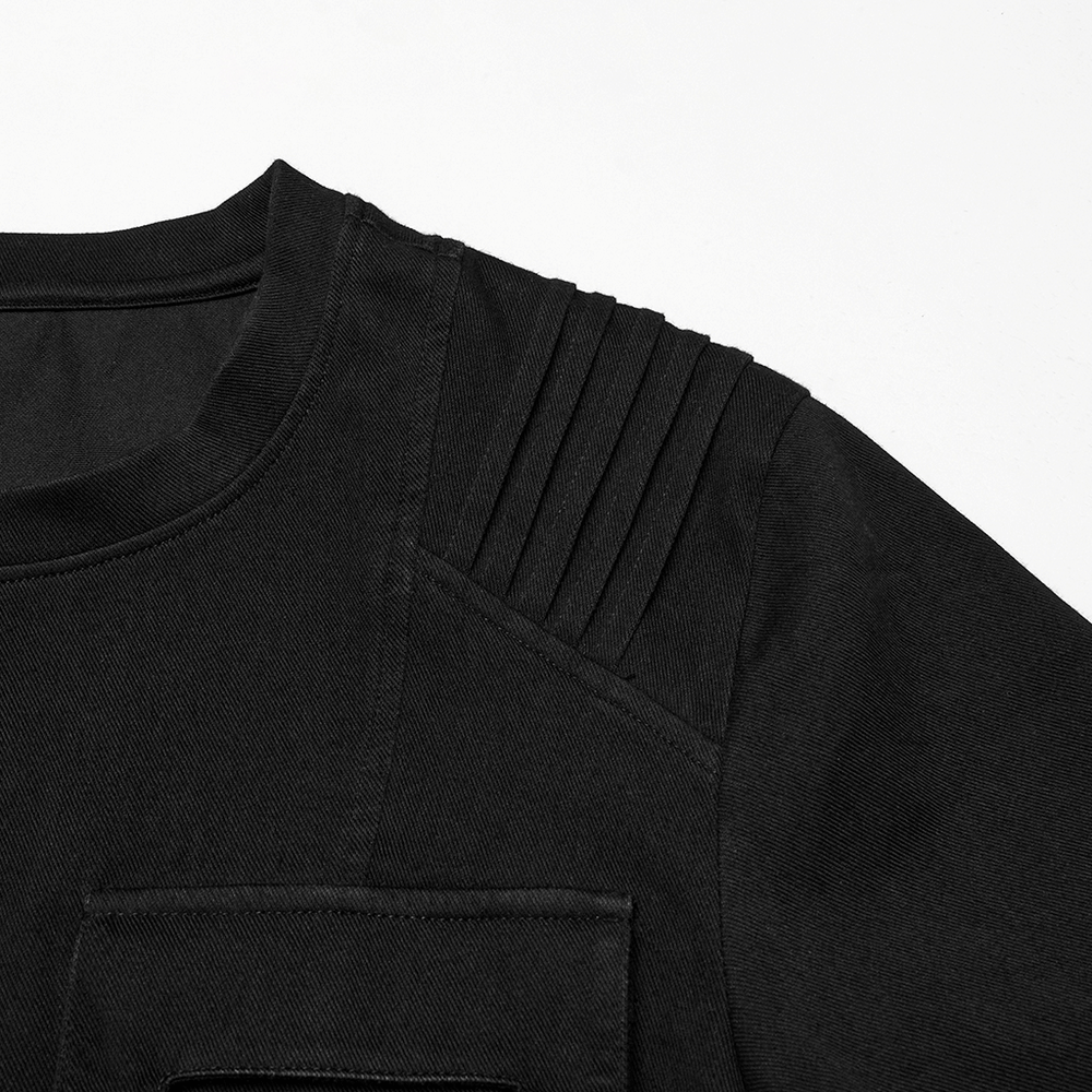 Close-up of black gothic T-shirt with shoulder pleats and flap pocket detail.