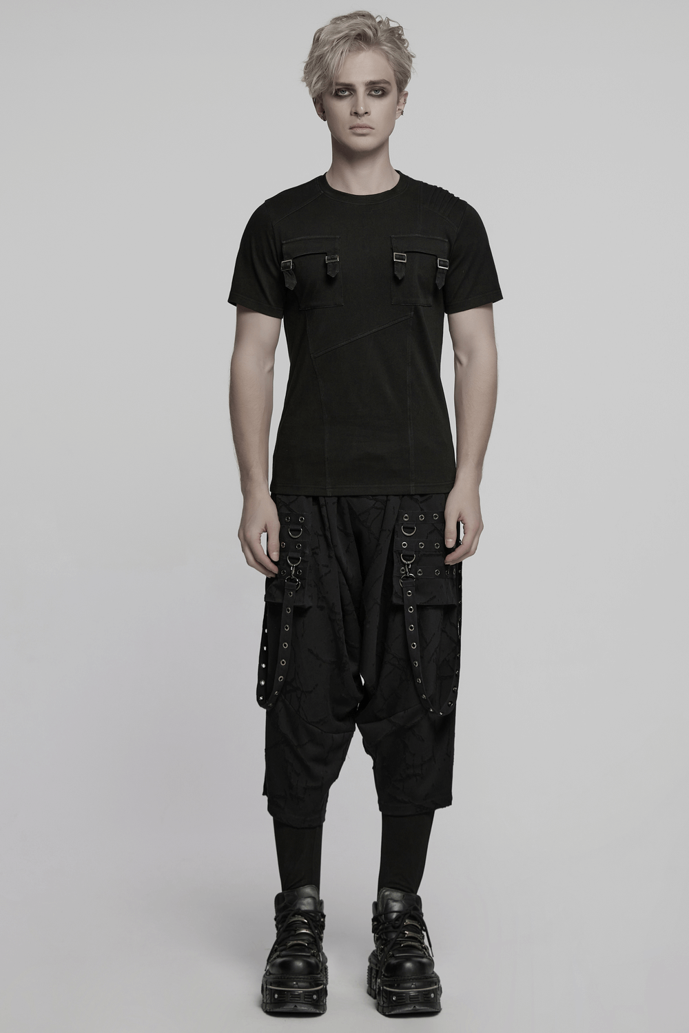 Black gothic T-shirt with buckles, layered details and pockets, paired with edgy cargo pants.