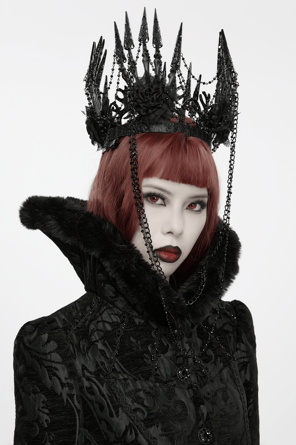 Black Gothic Thorn Crown with Chains and Bone Hands worn by a model with red hair and dark makeup in gothic style.