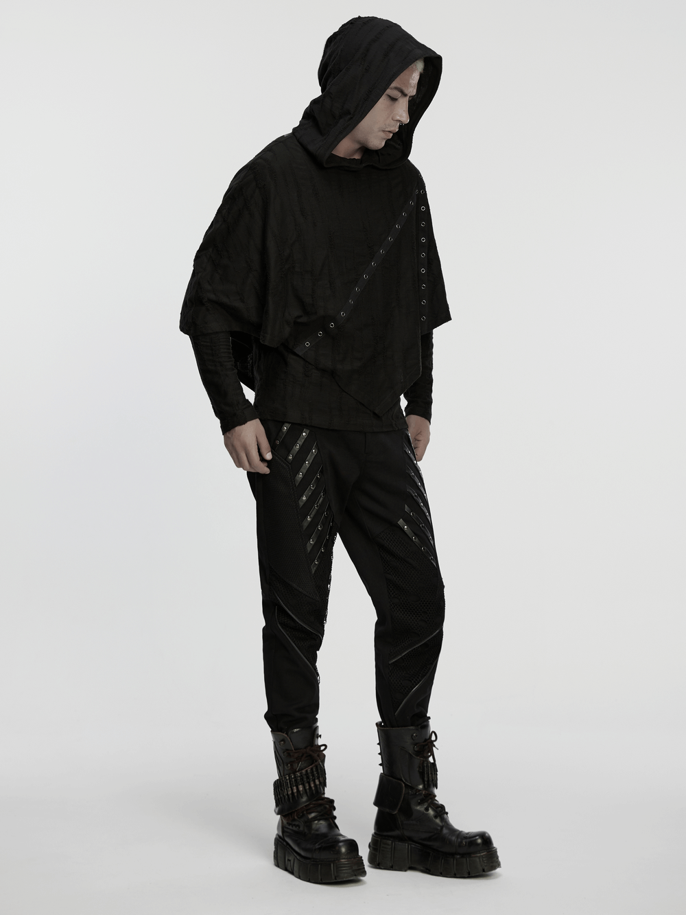 Black Gothic Twill Pants with Mesh and Rivet Detailing worn with a hooded top and chunky boots for a bold punk style.