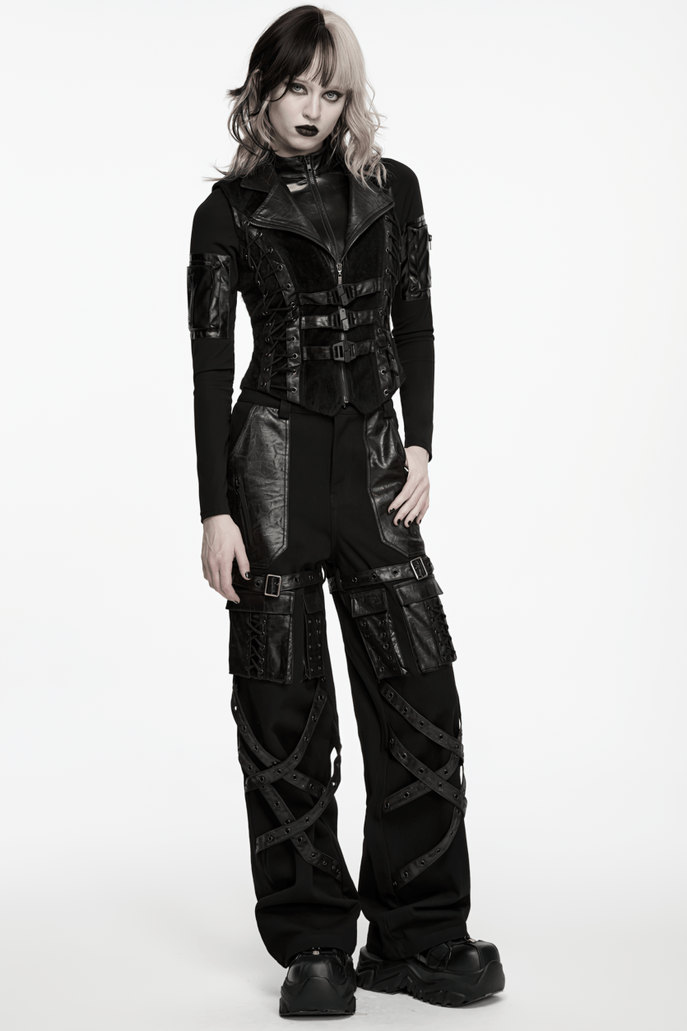 Black Gothic Utility Vest with Buckles and Corset Lacing styled with punk pants and a fierce look.