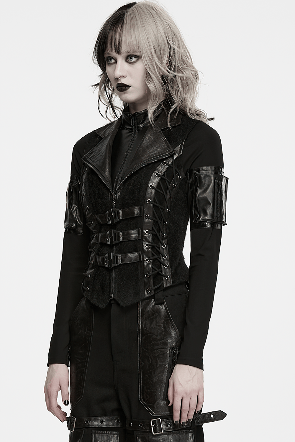 Black Gothic Utility Vest with Buckles and Corset Lacing modeled by a model in gothic attire, showcasing a punk style.