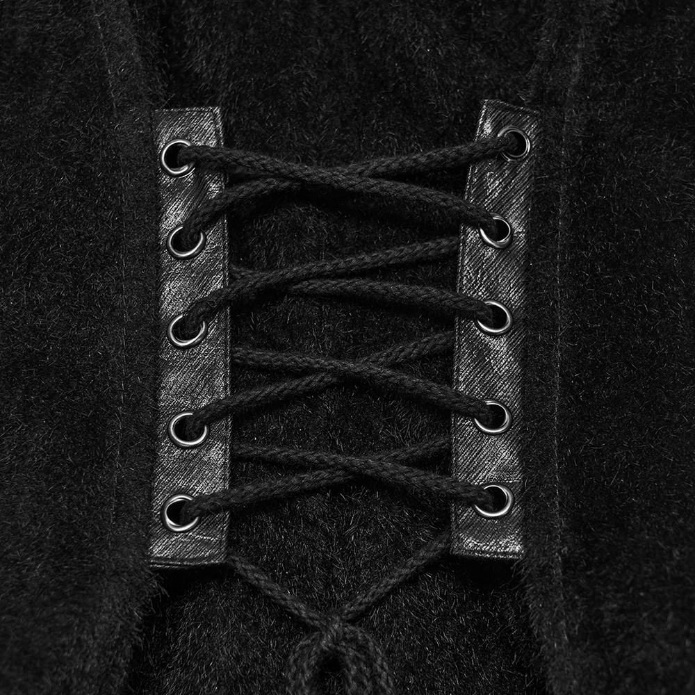 Close-up of Black Gothic Utility Vest with Buckles and Corset Lacing showcasing lacing detail and structured design.