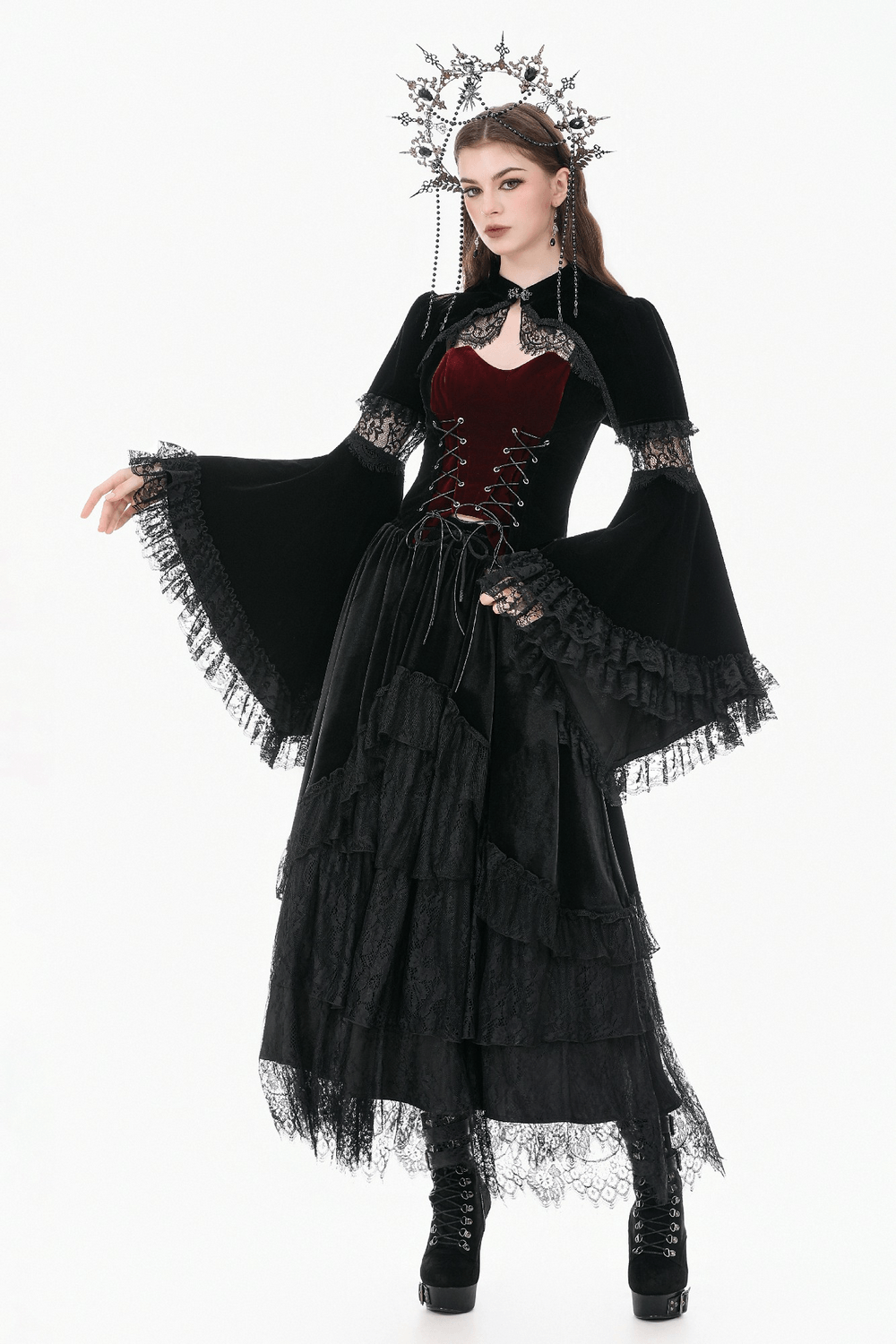 Black Gothic Velvet Cape with Bell Sleeves and Lace Trim worn by a model in an elegant gothic outfit.