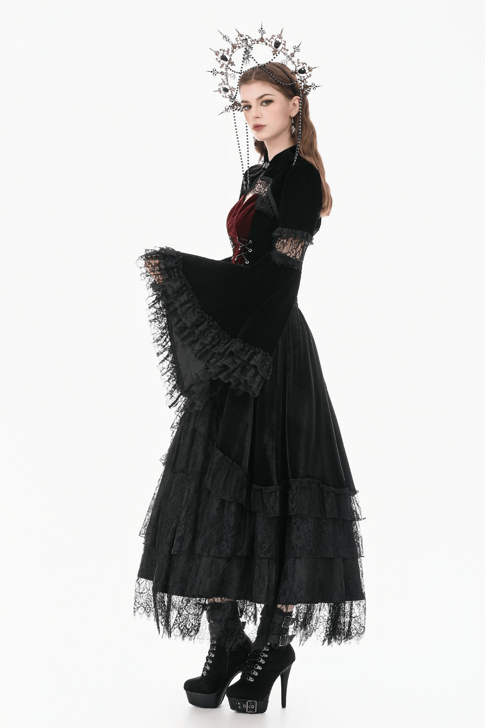 Black Gothic Velvet Cape with Bell Sleeves and Lace Trim worn with dramatic lace details and a crown.
