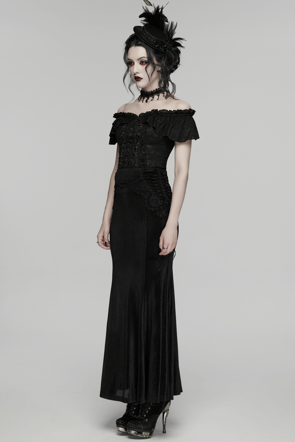 Black Gothic Velvet Mermaid Maxi Skirt with Lace worn by model showcasing elegant gothic style.