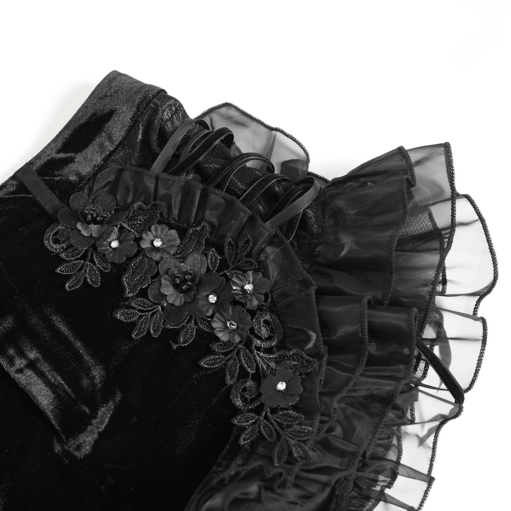 Black Gothic Velvet Shorts With Floral Ruffle Trim showcasing lace-up design and floral applique.