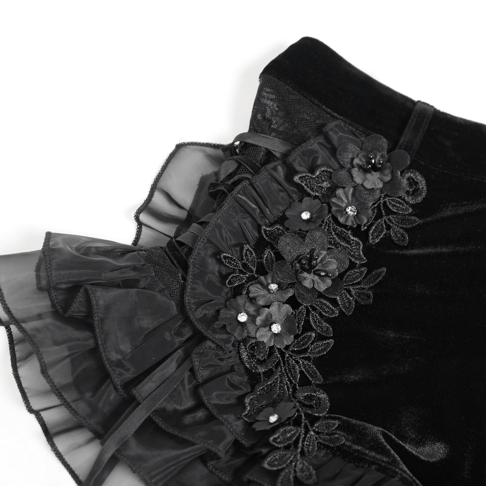 Black Gothic Velvet Shorts With Floral Ruffle Trim featuring floral applique and sheer organza ruffles.