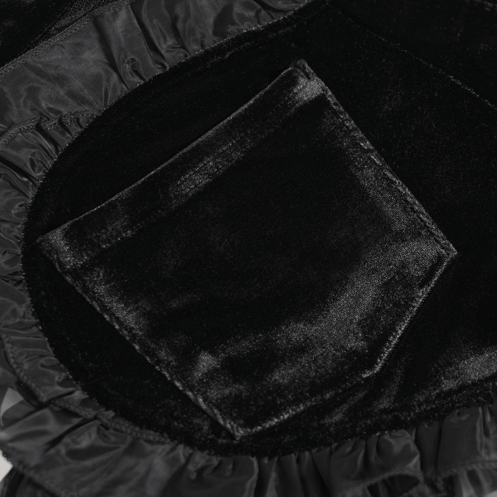 Black Gothic Velvet Shorts With Floral Ruffle Trim featuring a sleek black velvet pocket detail.