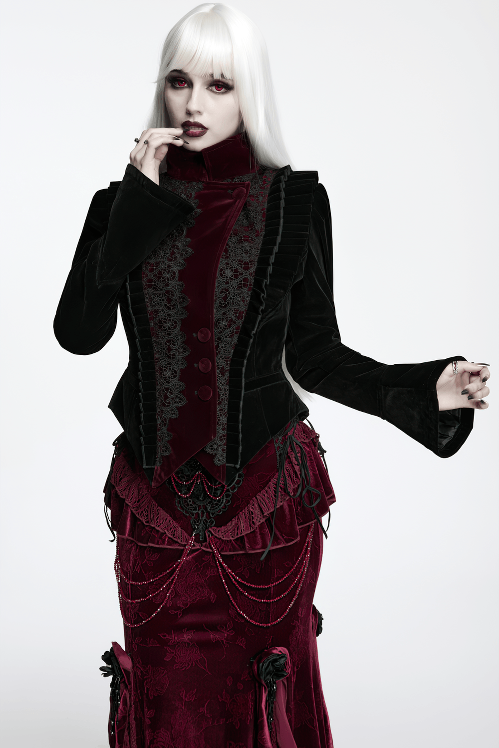 Black Gothic Velvet Tailcoat with Burgundy Lace Panels worn by a model with white hair and dramatic makeup.