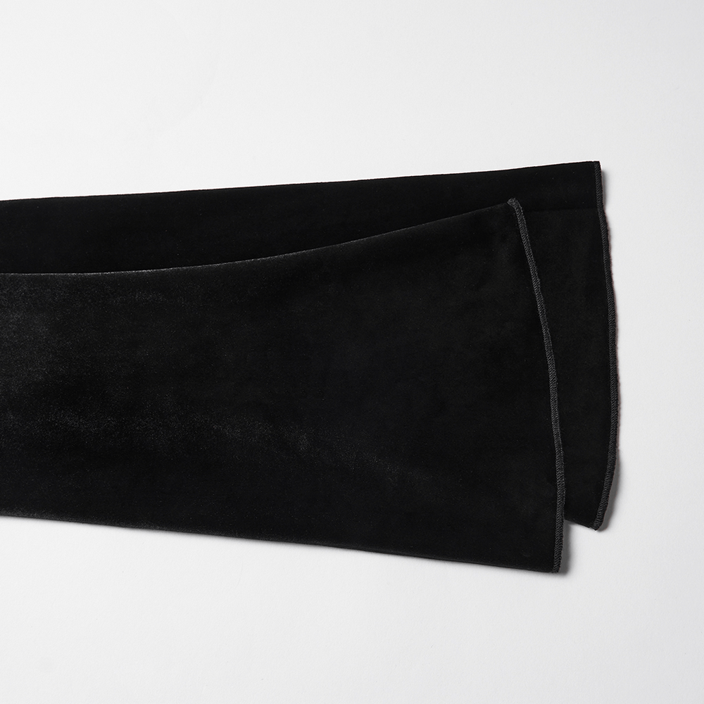 Black Gothic Velvet Top with Lace and Stud Details on a flat surface.