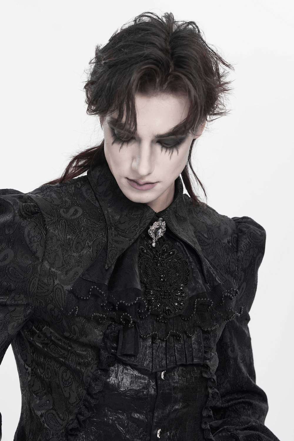 Black Gothic Victorian Jabot Collar With Brooch worn by a model showcasing its elegant design and intricate brooch.