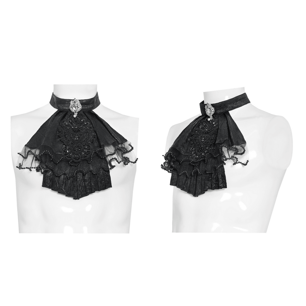 Black Gothic Victorian Jabot Collar With Brooch displayed on a mannequin, showcasing intricate lace and brooch detail.