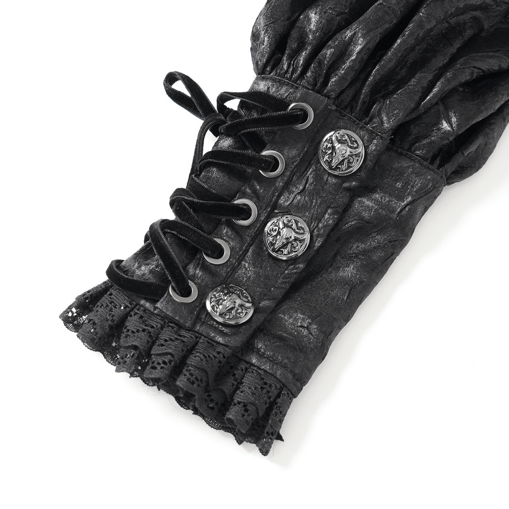 Close-up of the lace-up sleeve detail with buttons and lace trim on a black Gothic Victorian shirt.