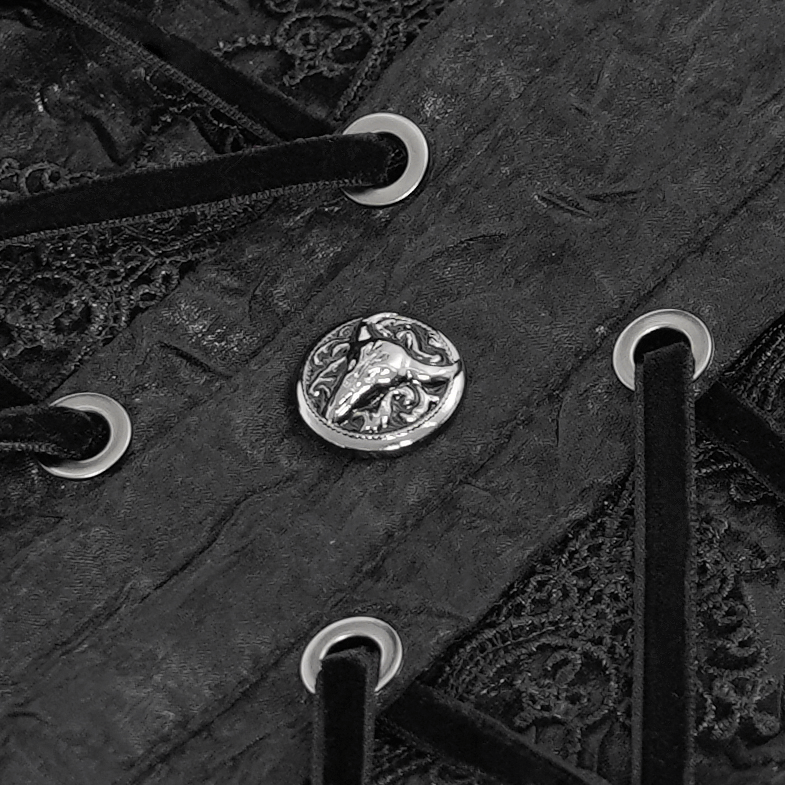Close-up of the lace-up detail on a black Gothic Victorian shirt featuring a decorative button.