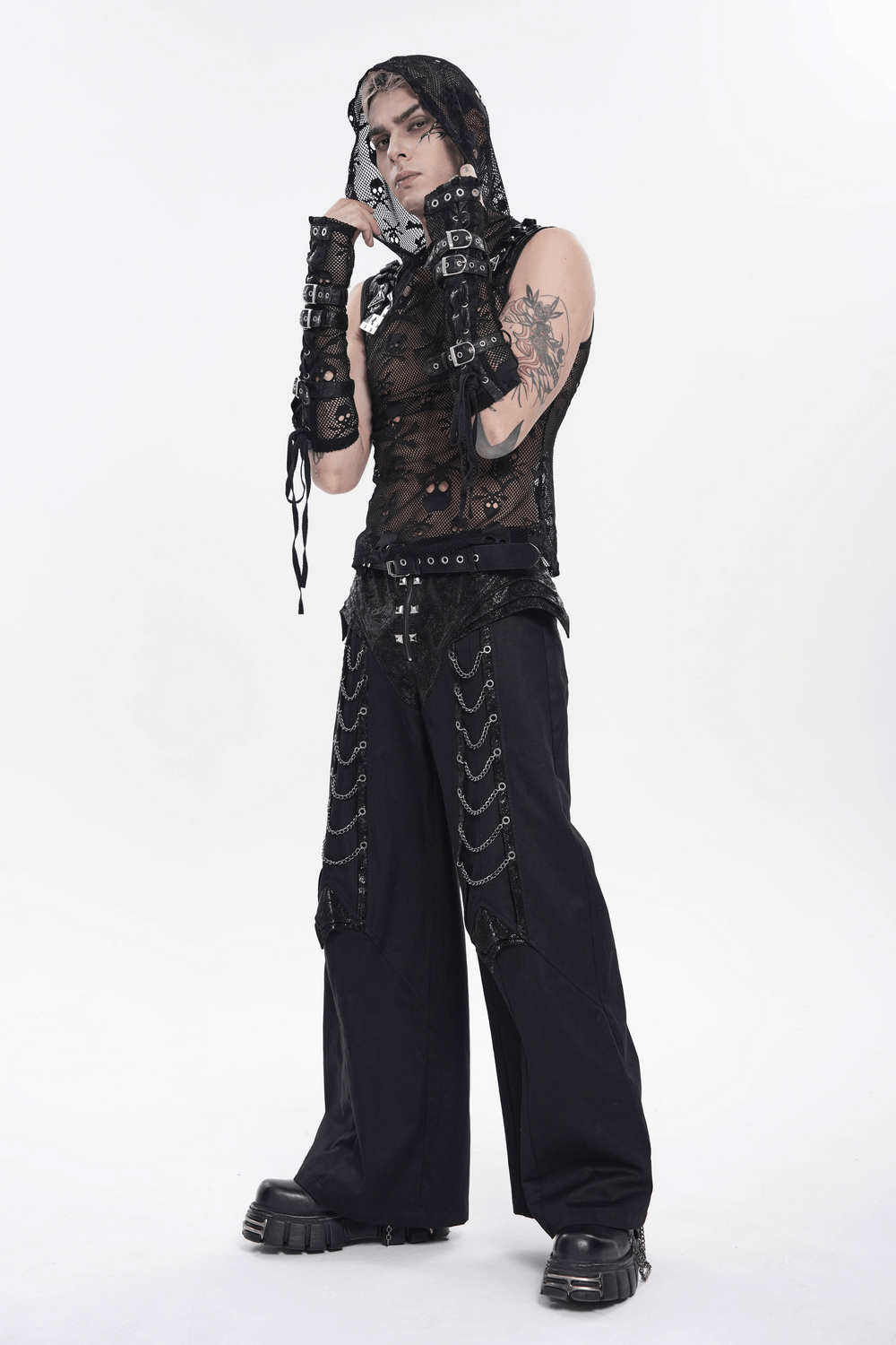 Black Gothic Wide Leg Pants with Chains and Studs showcased by a model in a dark streetwear ensemble.