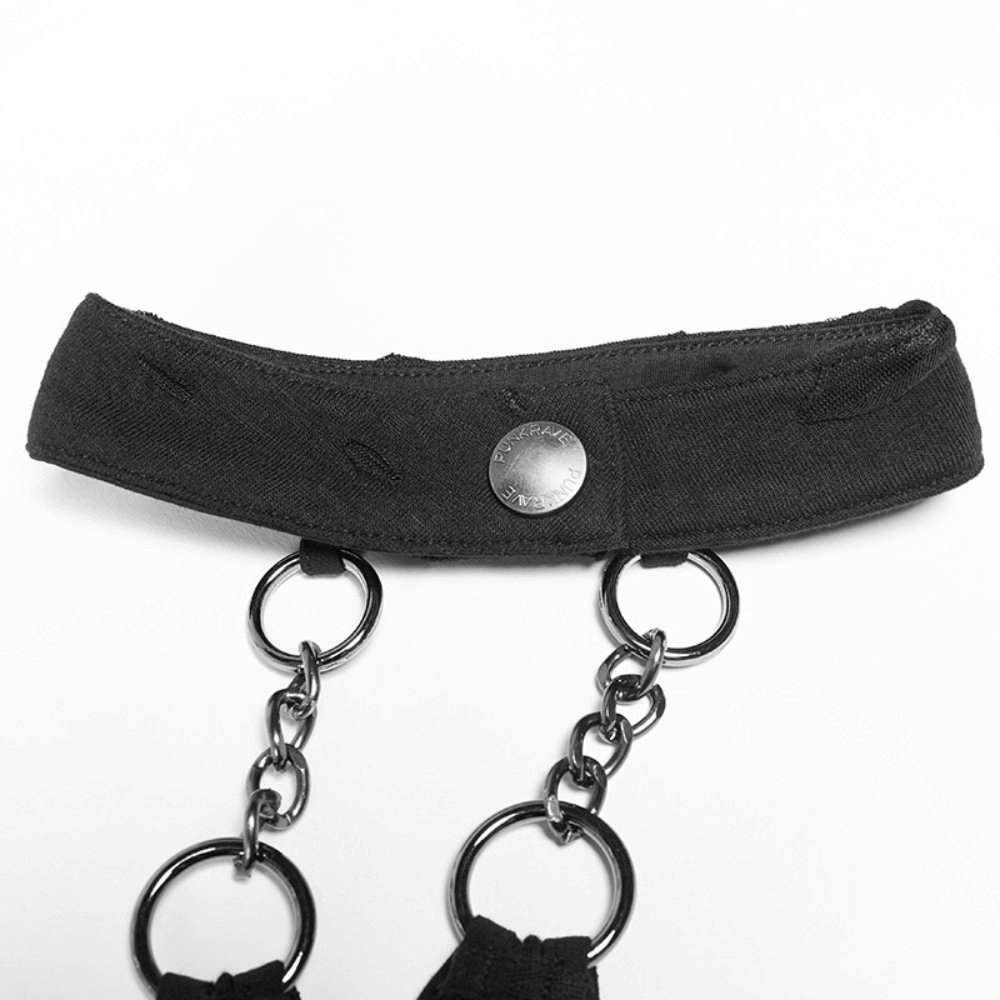 Close-up of a black halter top with metal chains and broken-hole detail, featuring a stylish punk rock design.