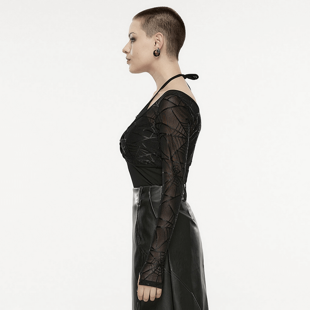 Side view of a black halter neck two-piece top with spiderweb sleeves, showcasing a trendy and edgy design.