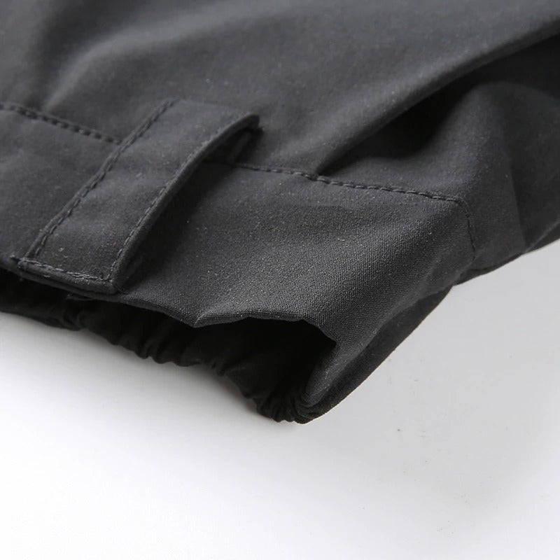 Close-up of the cuff detailing on black high waist cargo pants, showcasing the stylish design for women.