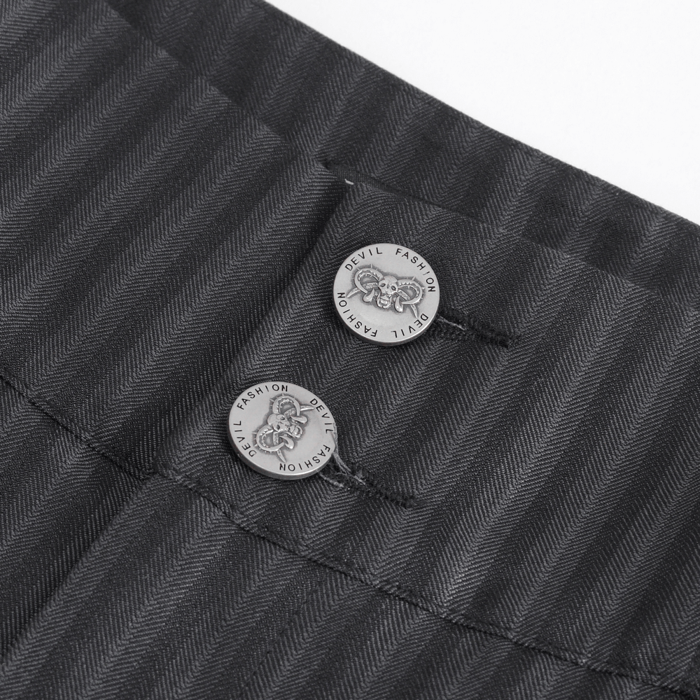 Close-up of black high-waisted trousers showing striped fabric and decorative Devil Fashion buttons.