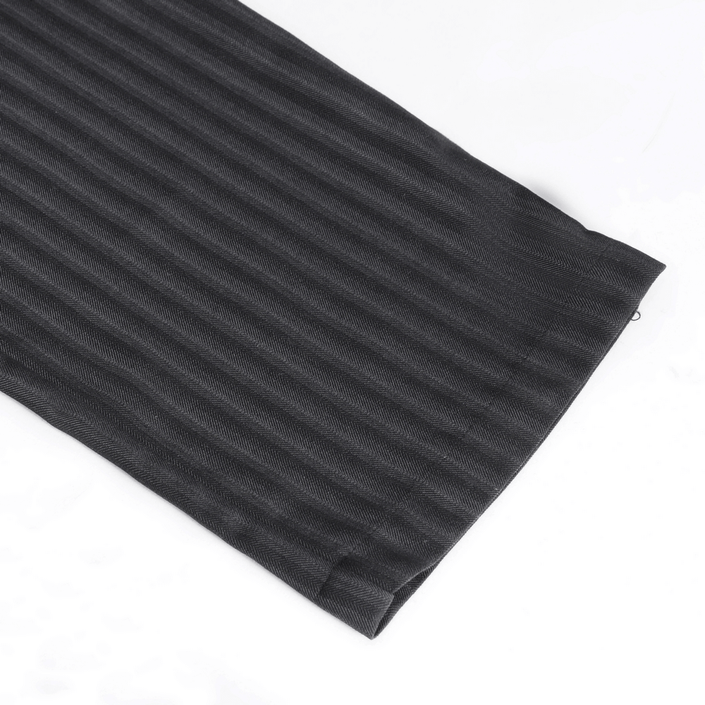 Close-up of black high-waisted striped trousers showcasing elegant fabric texture and lace-up side detail.