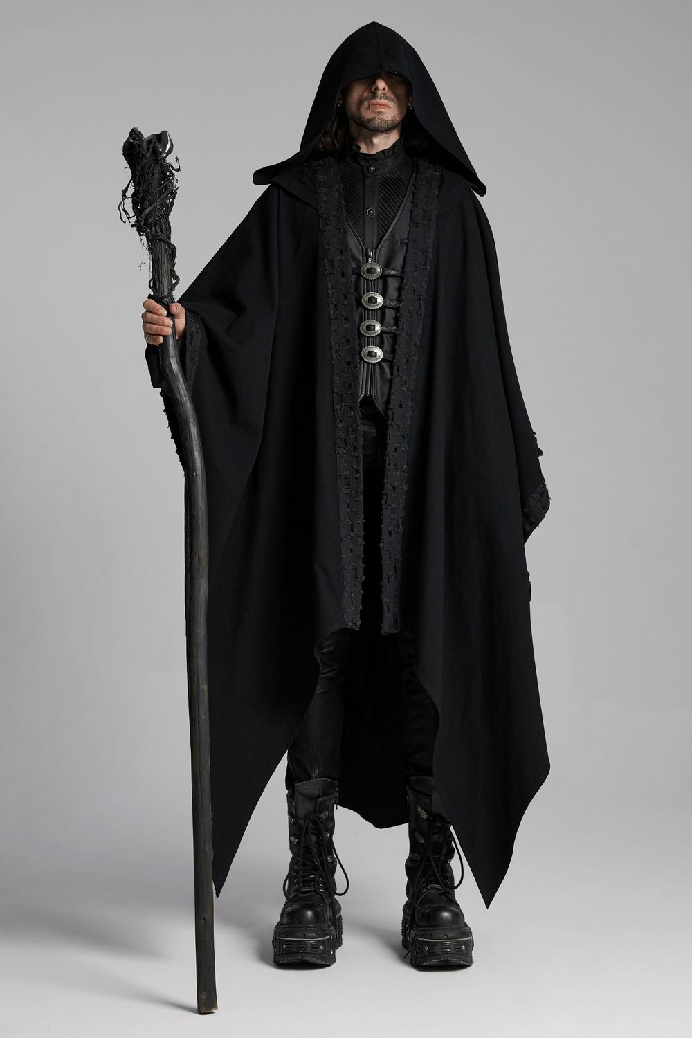 Black hooded cloak with gothic lace, worn by a dark mage holding a staff, exuding a mystical vibe.