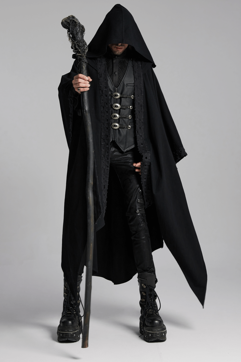 Mysterious figure in a black hooded cloak with lace trim, holding a staff, perfect for a gothic wardrobe.