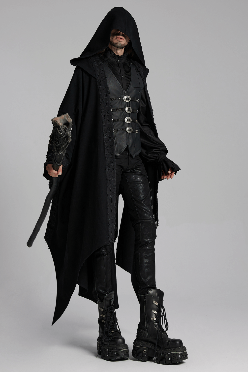 Black hooded cloak with gothic lace, styled with a vest, leather pants, and platform boots for a dark mage look.