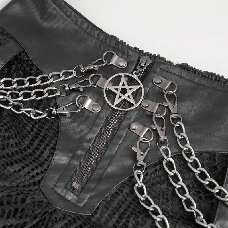 Close-up of black irregular skirt with metal chains and pentagram detail, showcasing gothic style and front zipper closure.