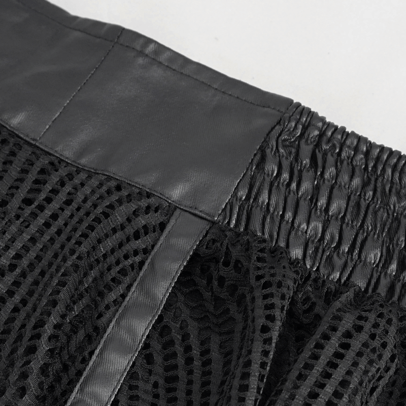Close-up of the black irregular skirt showing textured fabric and elastic waist detail, perfect for gothic fashion.
