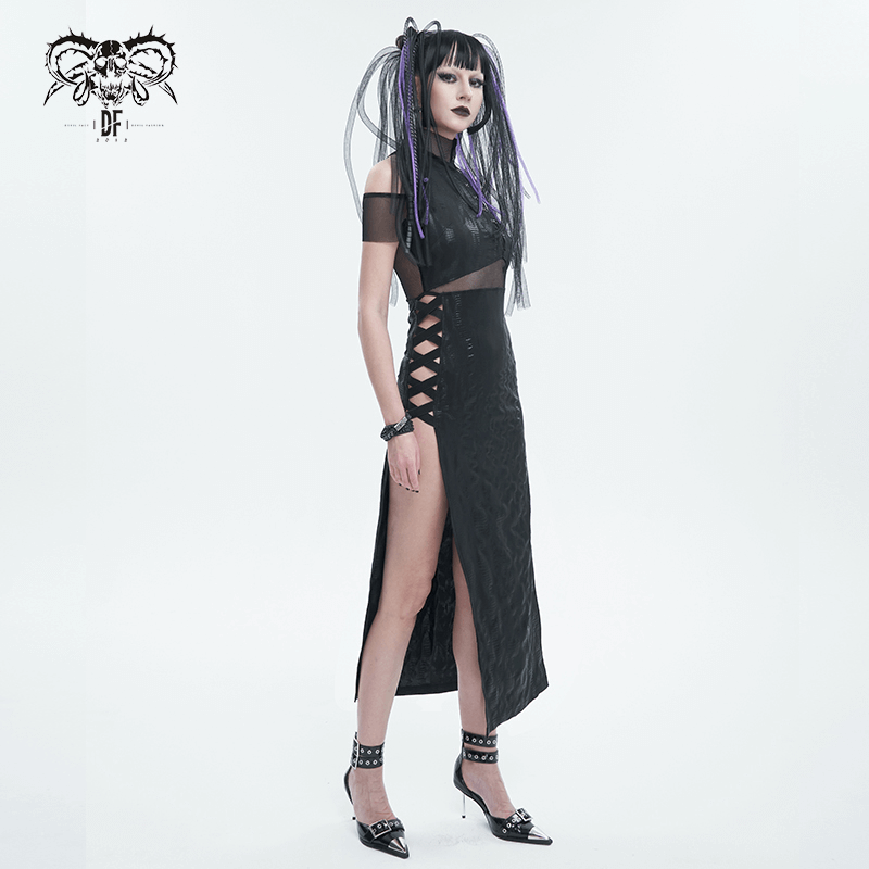 Model in black irregular off-shoulder split dress with mesh details and stylish side slits, showcasing alternative chic fashion.