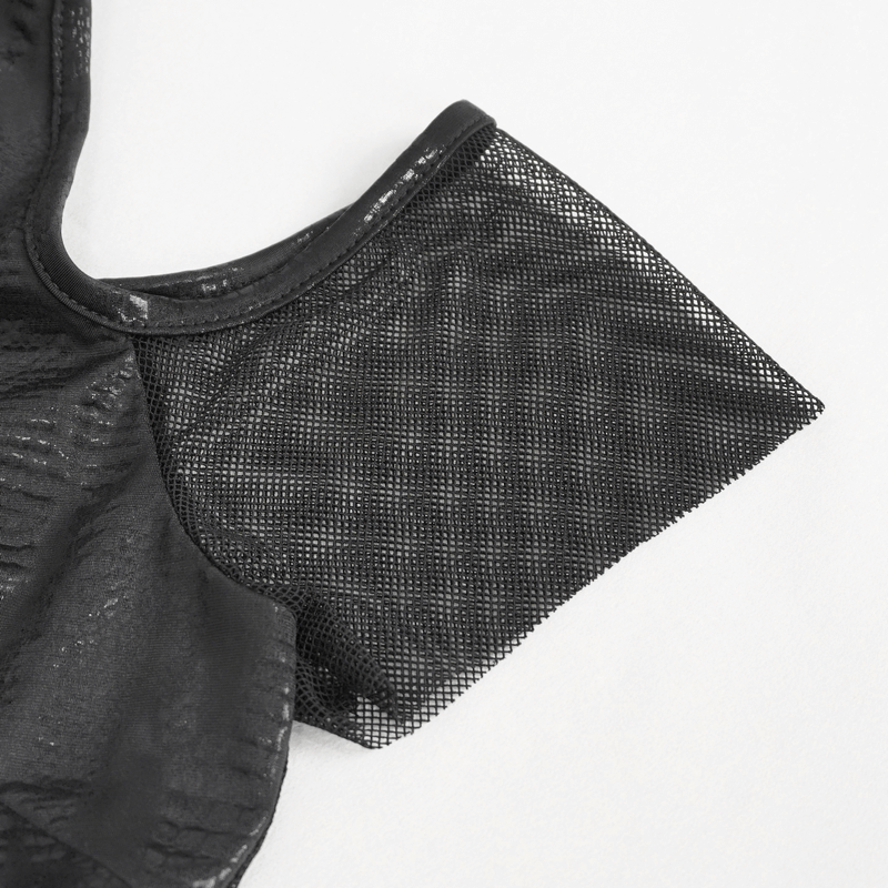Close-up of black irregular off-shoulder dress revealing stylish mesh details and modern design elements.