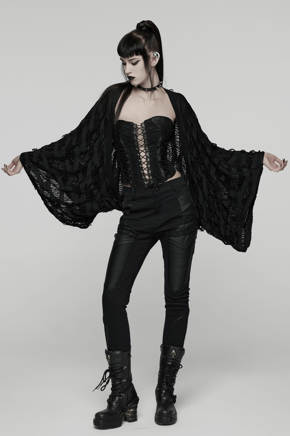 Black Knit Punk Cardigan with Ragged Loose Sleeve Design worn by a model in a stylish pose.