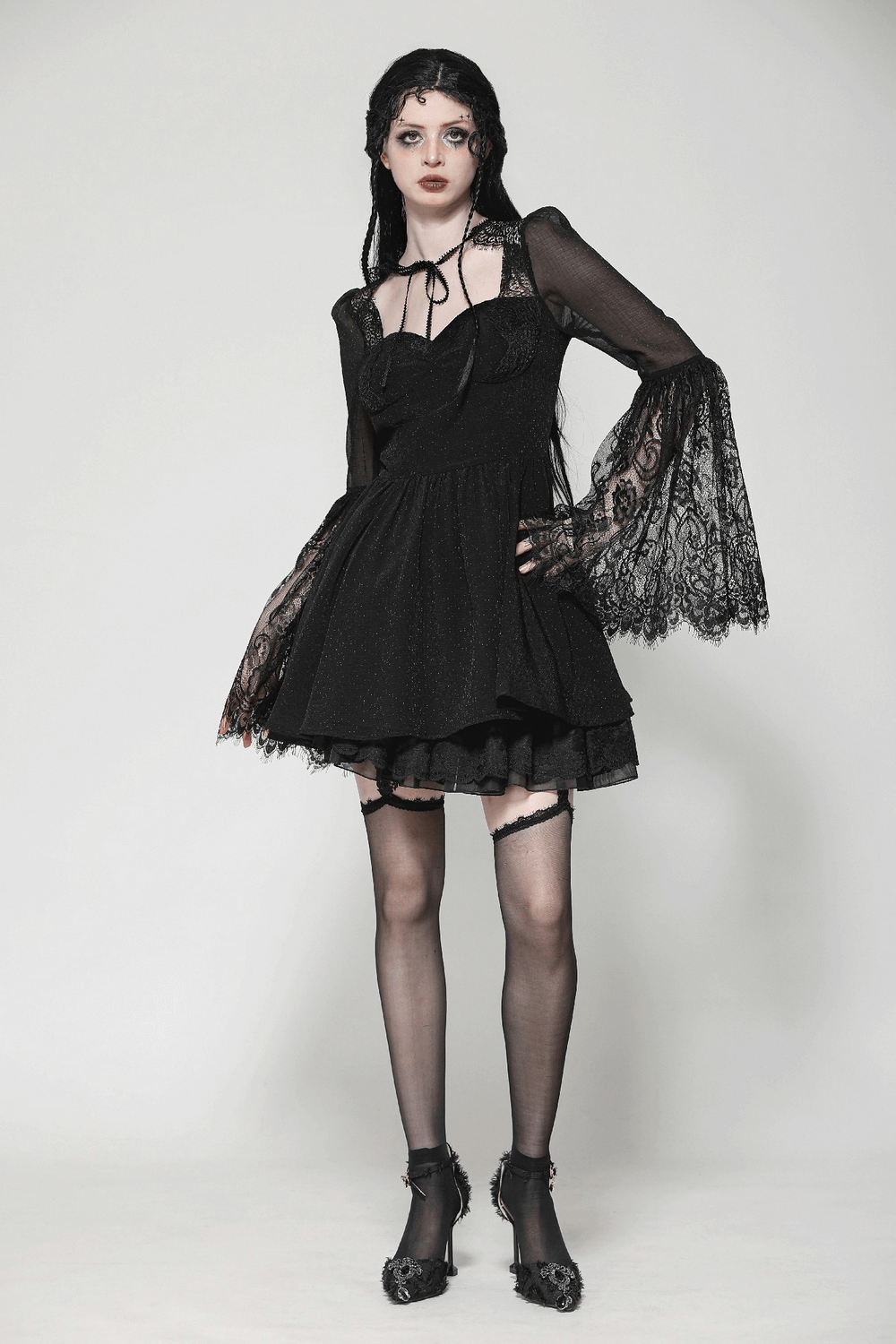 Gothic black lace bell-sleeved dress with corset back, sheer mesh, and romantic lace details.