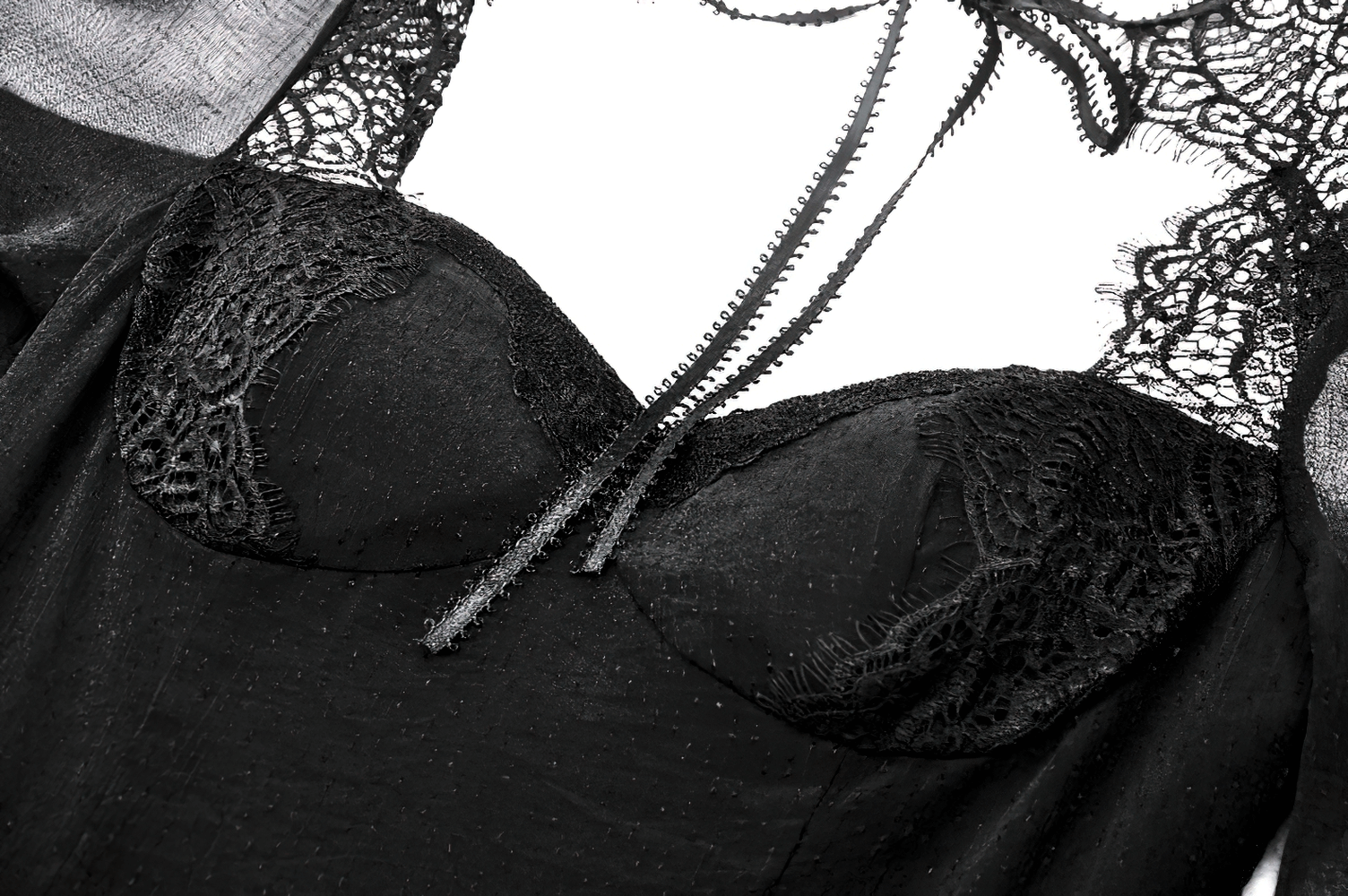 Black lace bell-sleeved dress featuring a corset back and romantic lace detail for gothic elegance.