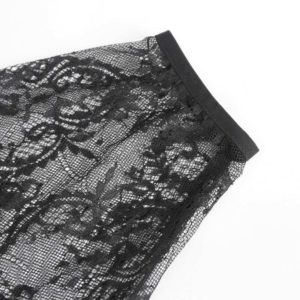 Close-up of intricate black lace showcasing delicate patterns, perfect for a gothic Victorian style top.