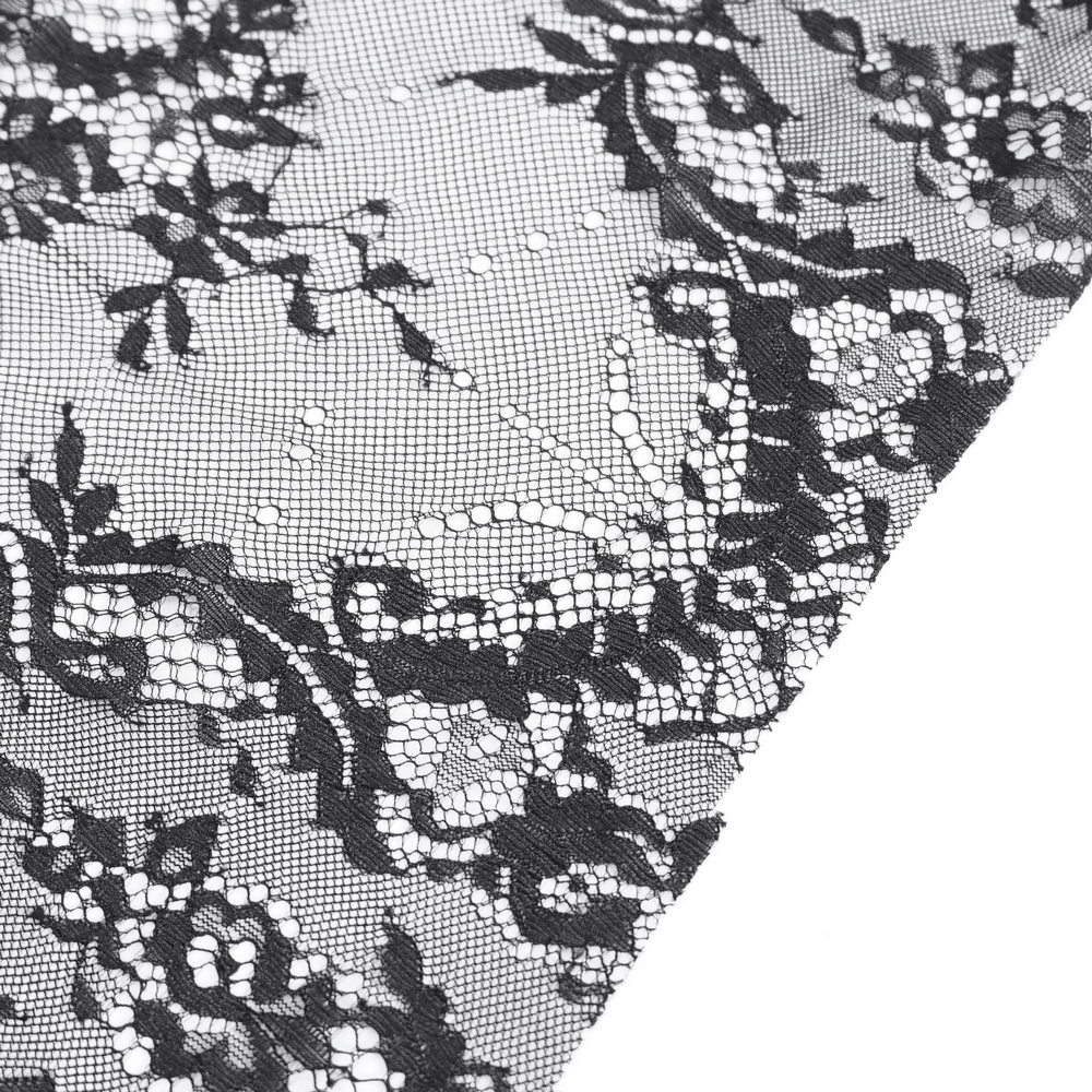 Elegant black lace fabric showcasing intricate floral patterns, perfect for gothic and Victorian-style fashion.