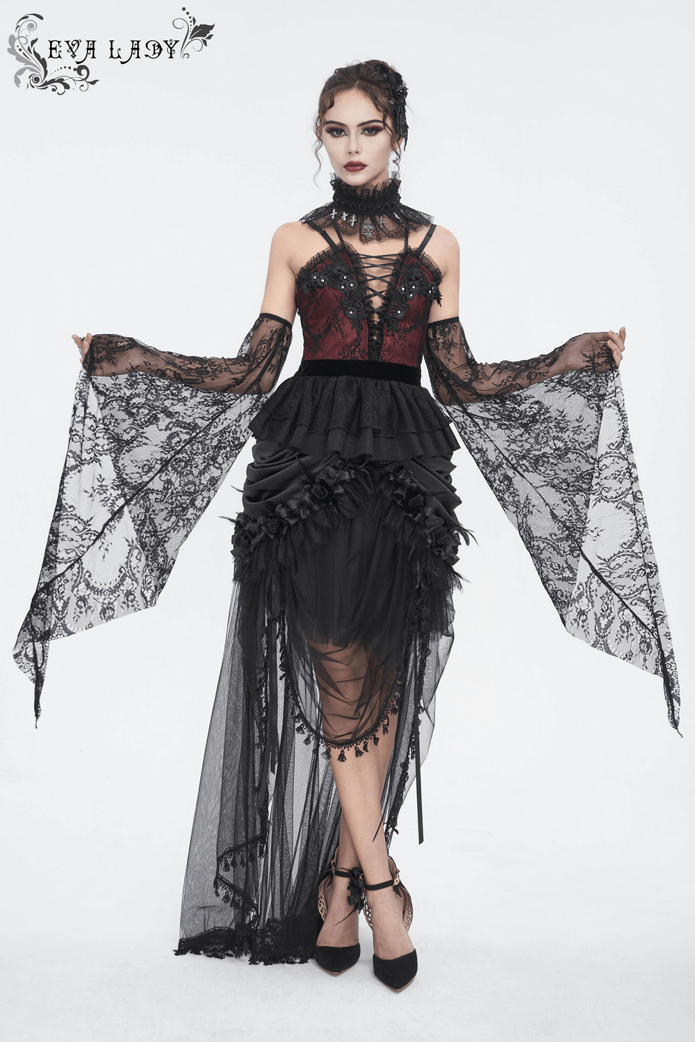 Elegant black lace dress with dramatic bell sleeves and ruffled details, perfect for gothic or Victorian-inspired outfits.