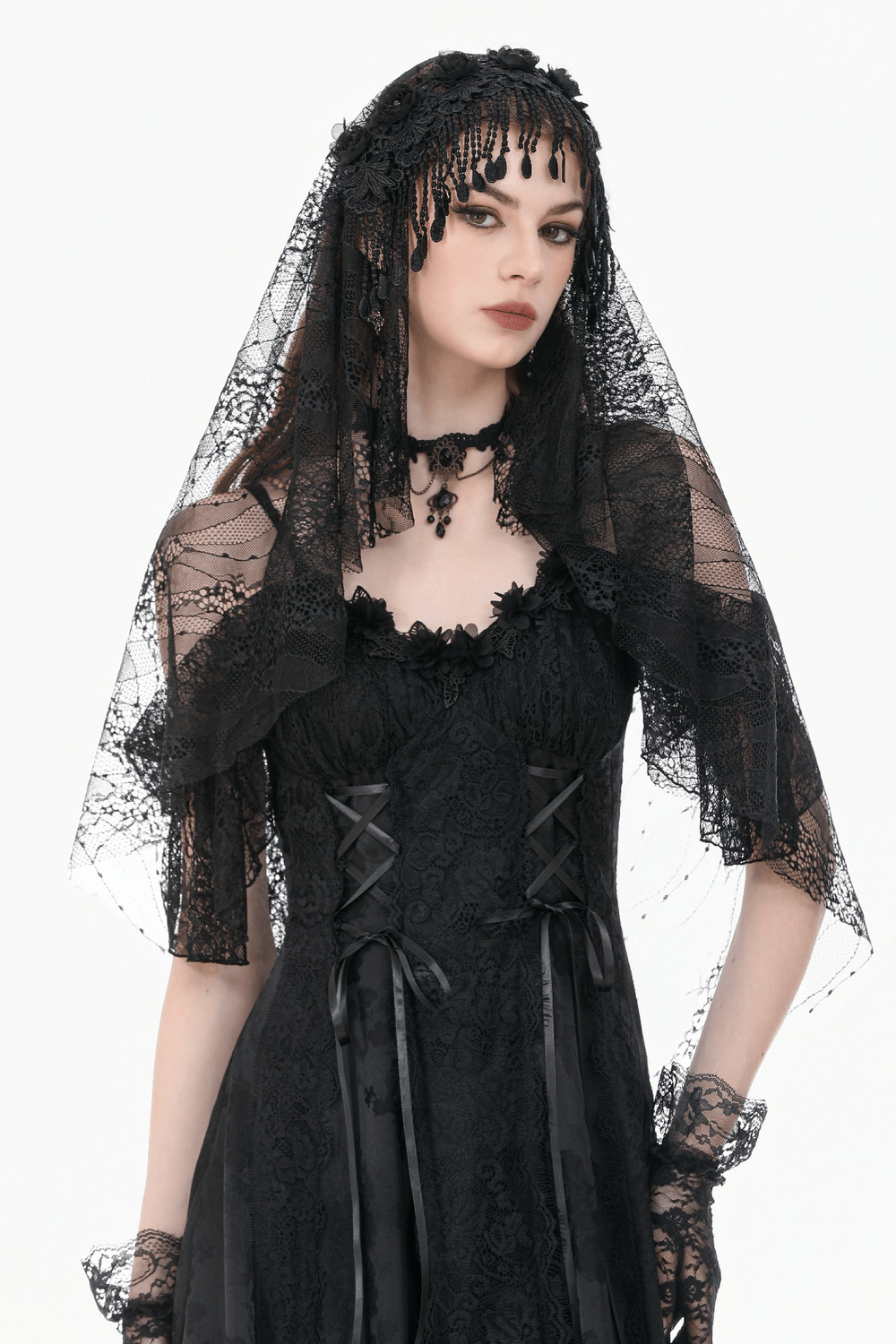 Black Lace Bridal Veil with Beaded Fringe Headpiece adorning a model in a stunning black gown.