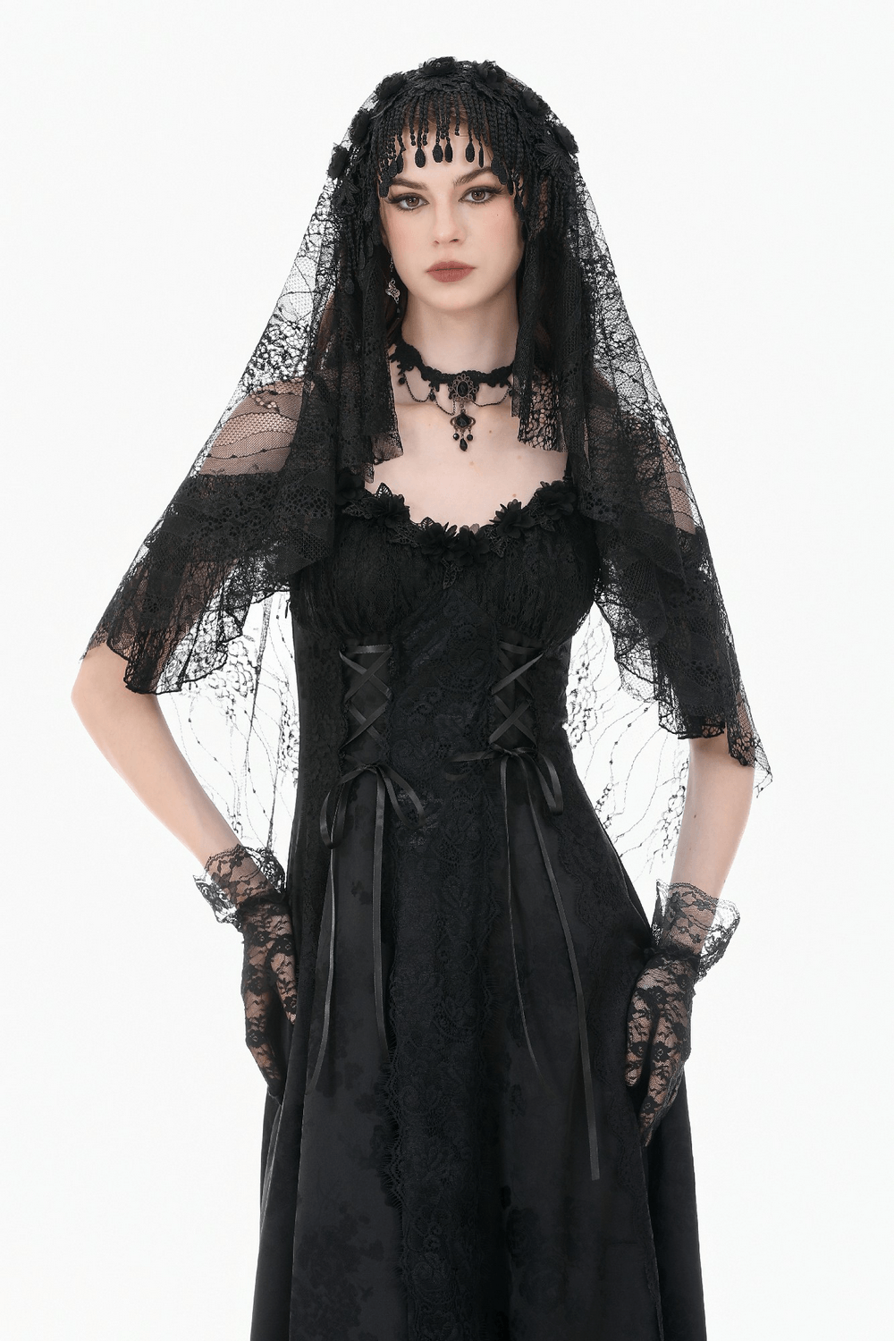 Model wearing Black Lace Bridal Veil with Beaded Fringe Headpiece, showcasing a gothic bridal look.