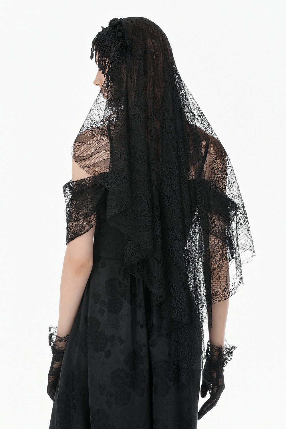 Black Lace Bridal Veil with Beaded Fringe Headpiece worn by a model, showcasing intricate lace design.