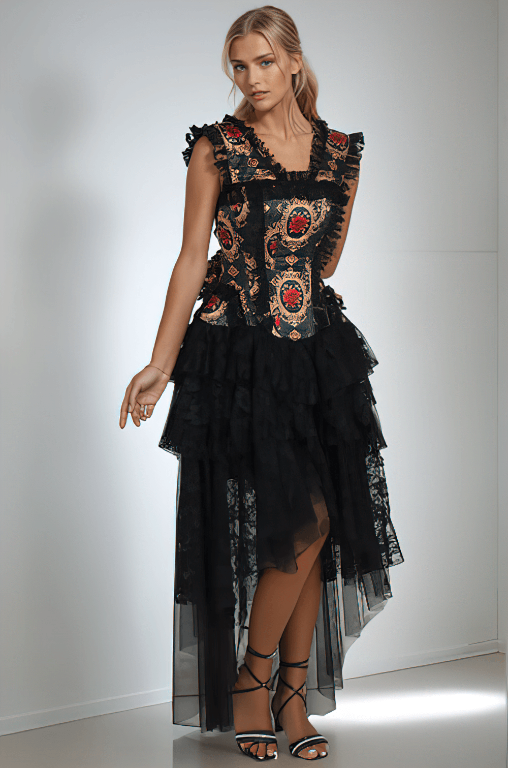 Black lace corset dress featuring red rose gothic print, stylish ruffles, and layered tulle for a dramatic look.