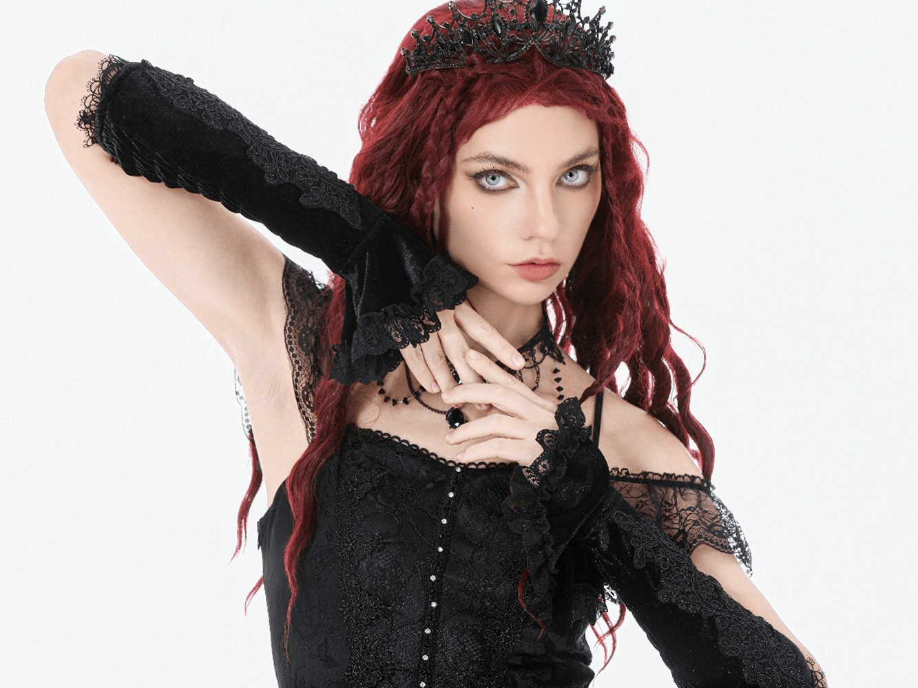 Black Lace Gothic Arm Warmers with Ruffles and Floral Design worn by a model showcasing gothic style.