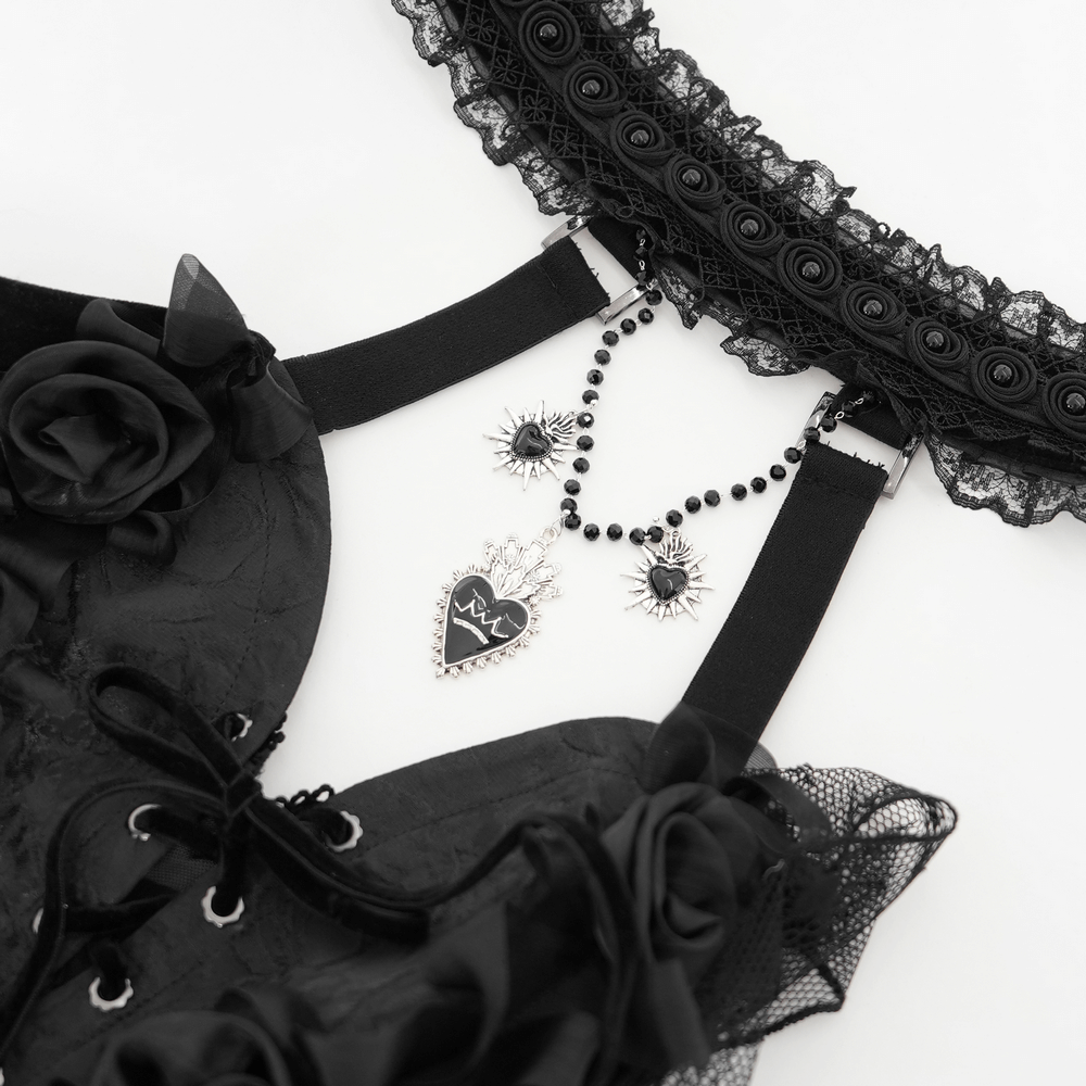 Elegant black lace halterneck top with roses, chains, and gothic detailing for a bold fashion statement.