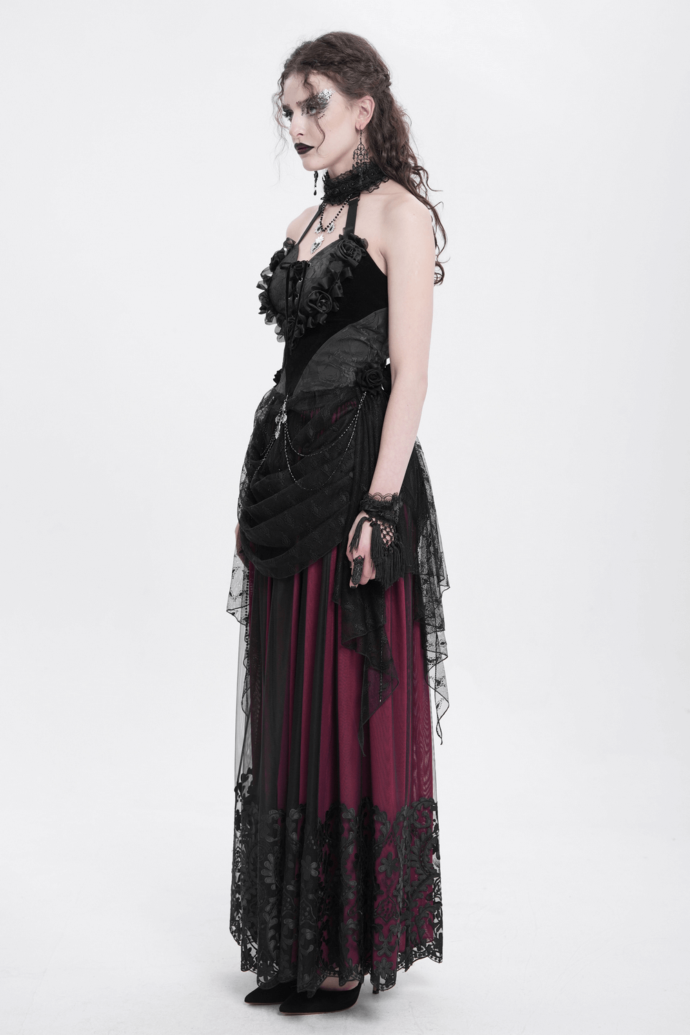 Gothic halterneck top with black lace, roses, and chains, paired with a flowing layered skirt, perfect for dark romantic style.