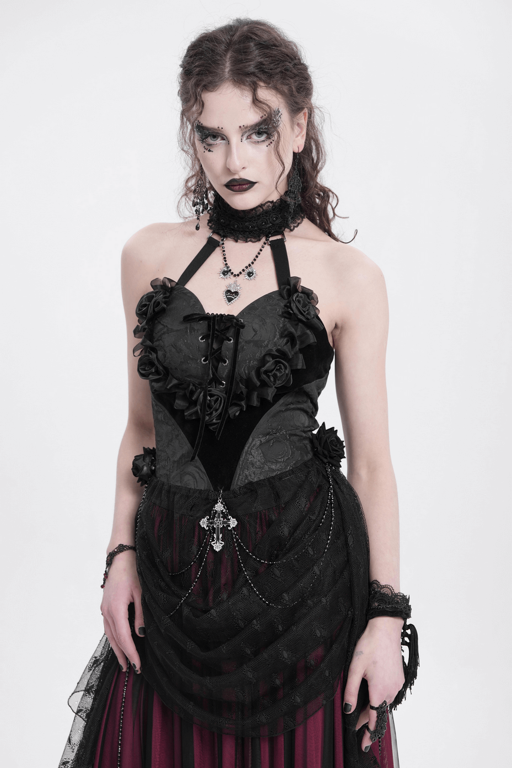 Elegant black lace gothic halterneck top with rose details and chains, perfect for stylish, edgy fashion lovers.